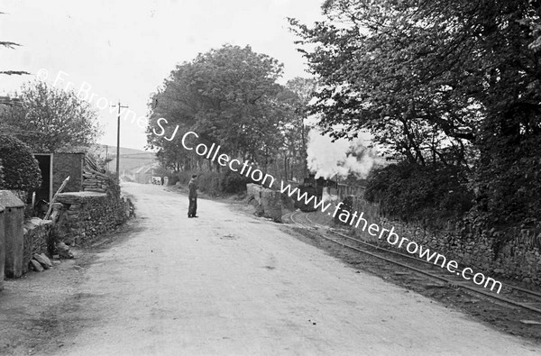 DINGLE TRAIN ON MAIN ROAD